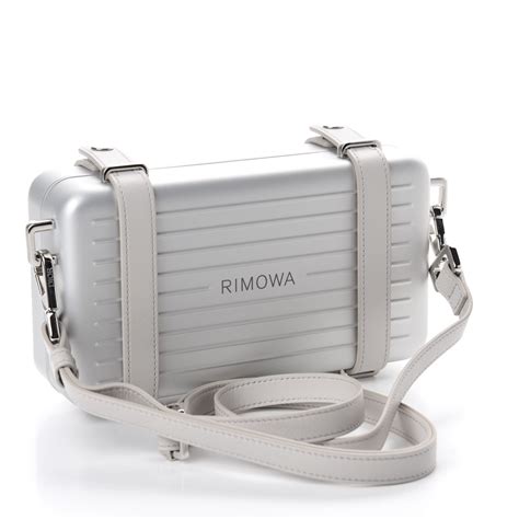 rimowa dior clutch|christian dior silver clutch.